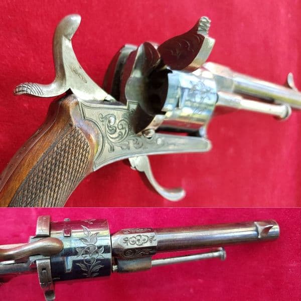 An exceptional engraved  7mm 6 shot pinfire revolver with lots of original blued finish. Ref 1919.